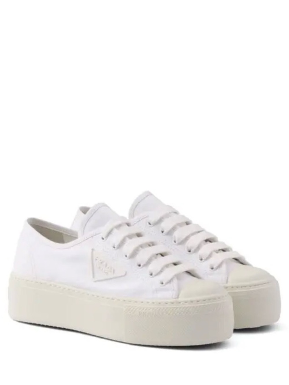 Can’t find in US-  Prada White Platform Canvas Low-Top Sneakers
